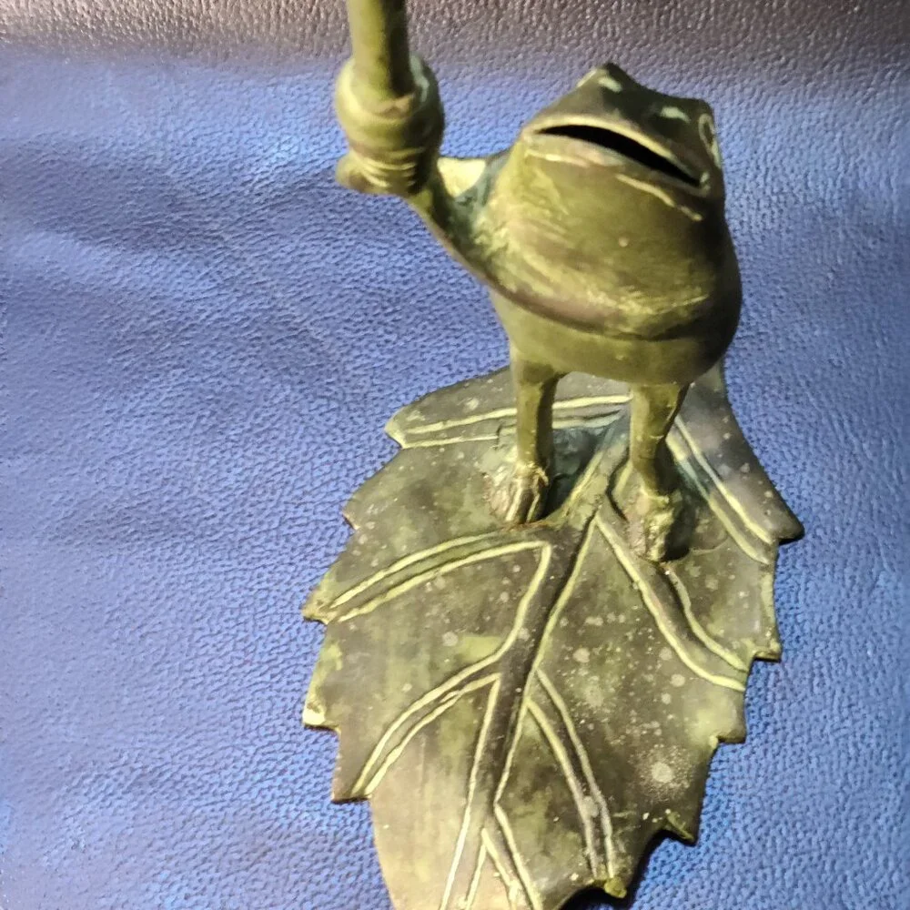 Brass Frog Sculpture holding a candlestick while floating on a lilypad 11